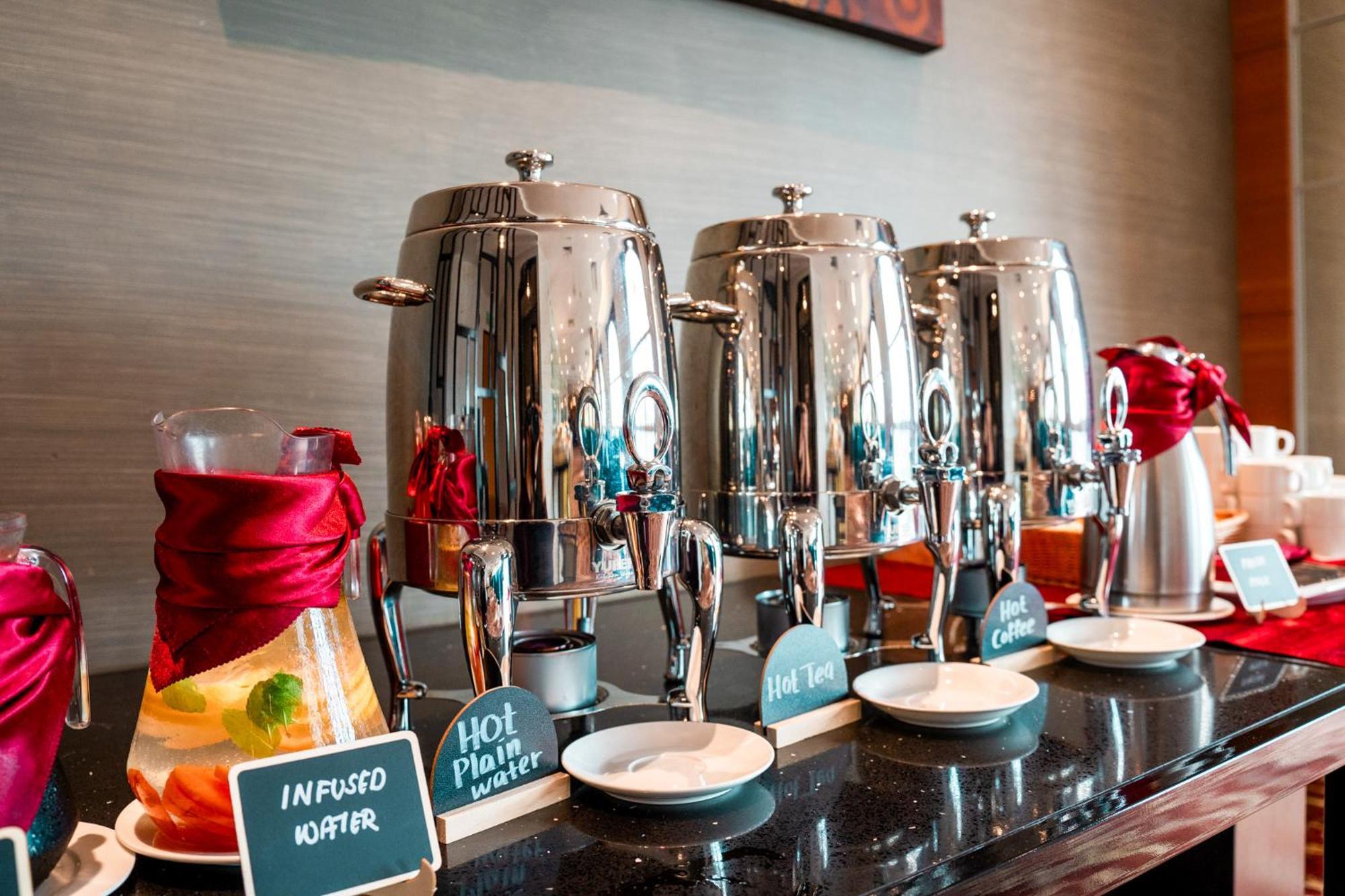 The Waterfront Hotel Кучинг Экстерьер фото A selection of hot and cold beverages